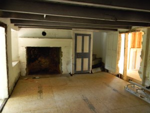 The old fireplace is opened